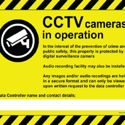 Yellow and black CCTV cameras in operation